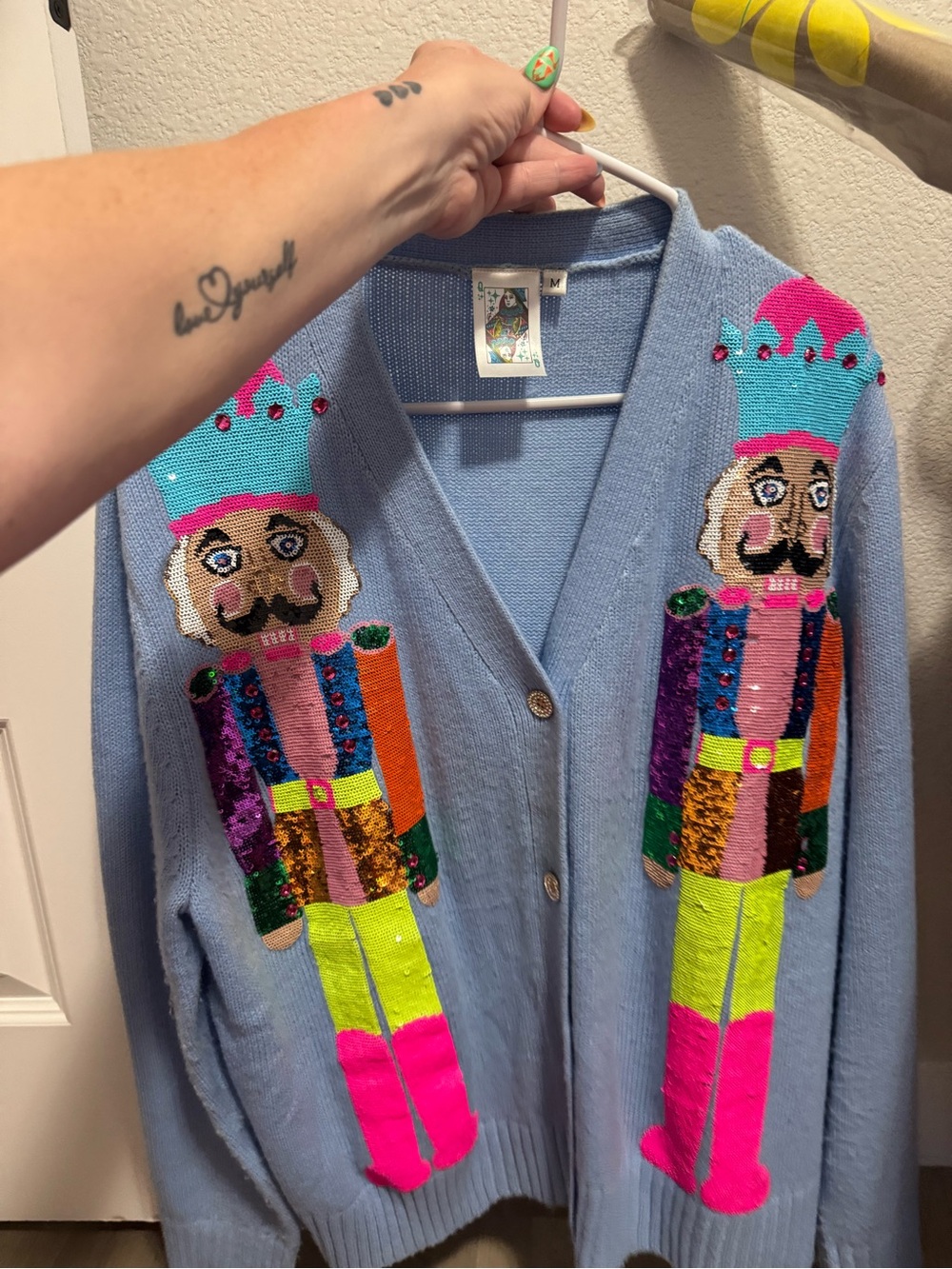 Light Blue Cardigan Sweater with Colorful Nutcracker Sequin Design - Picture 7 of 9